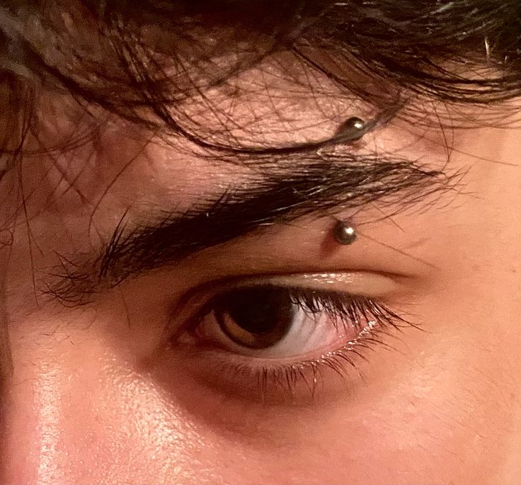 Eye Bow Piercing